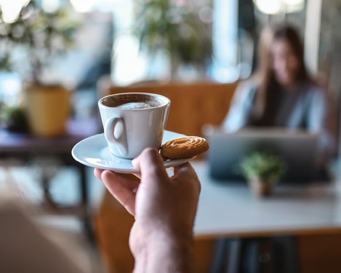 Image of coffee and a cookie