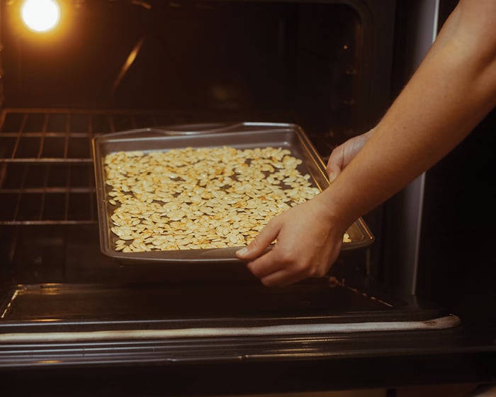 Pumpkin seeds going into oven