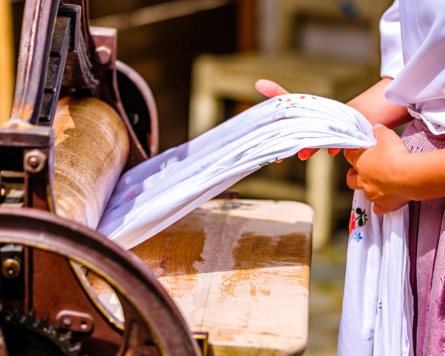Wringer washer via Getty Images