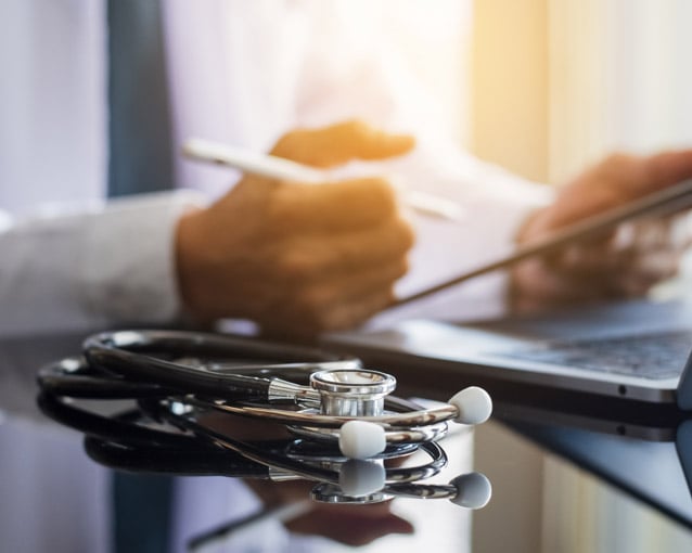 Doctor reviewing guidance