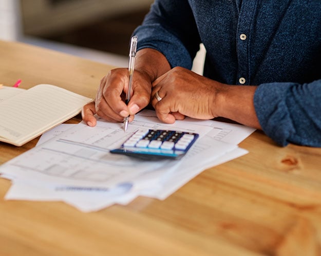 Man-Working-On-Financials