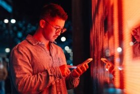 man looking at phone