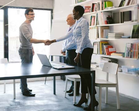 Job Interview with young male candidate in modern office