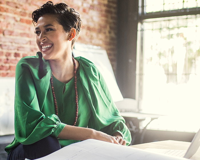 woman smiling and looking away
