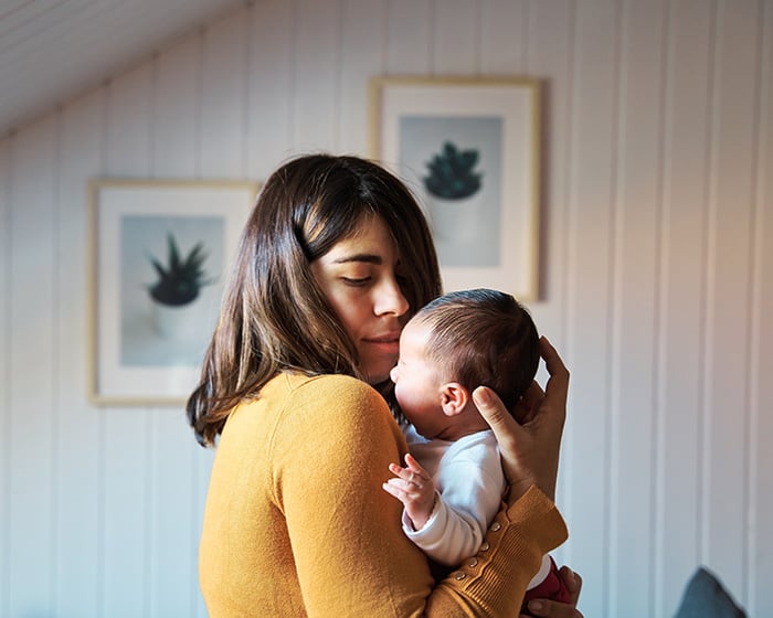 woman holding a baby