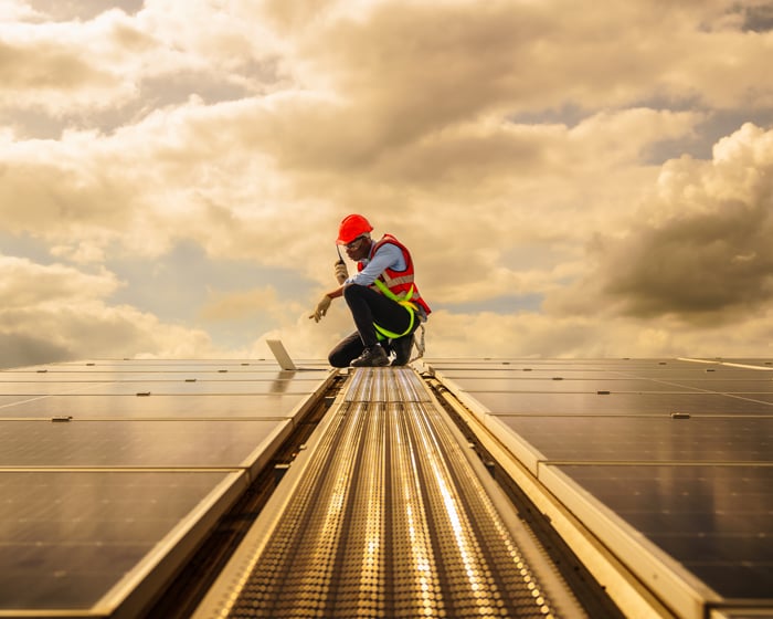 Construction worker with cloud bg