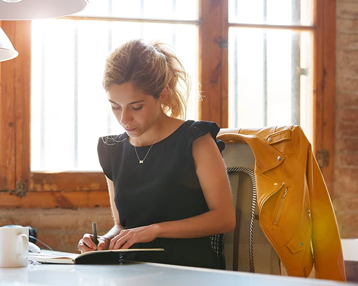 woman writing something