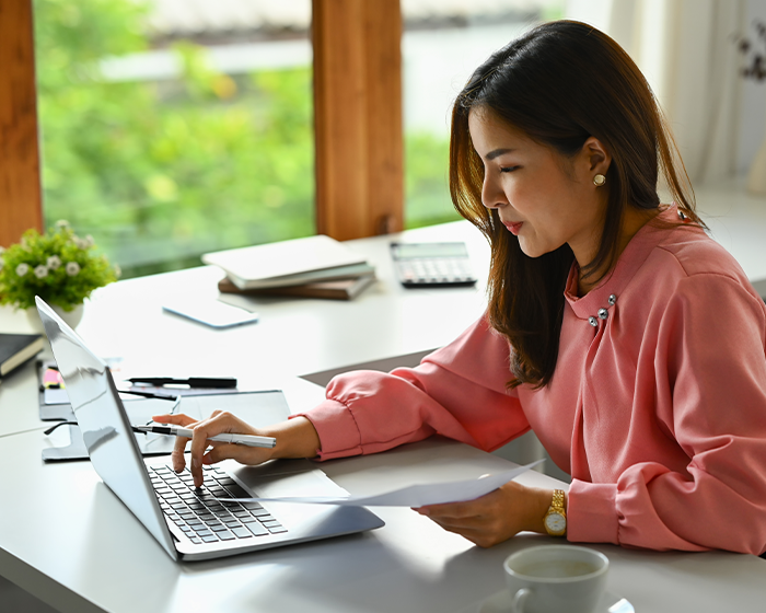woman working on her laptop