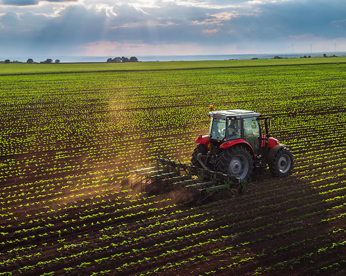Tractor driving through a field