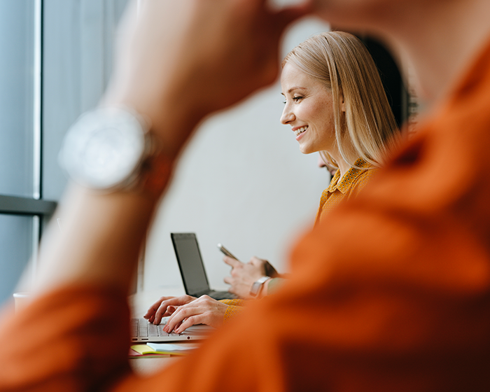 woman typing on a computer