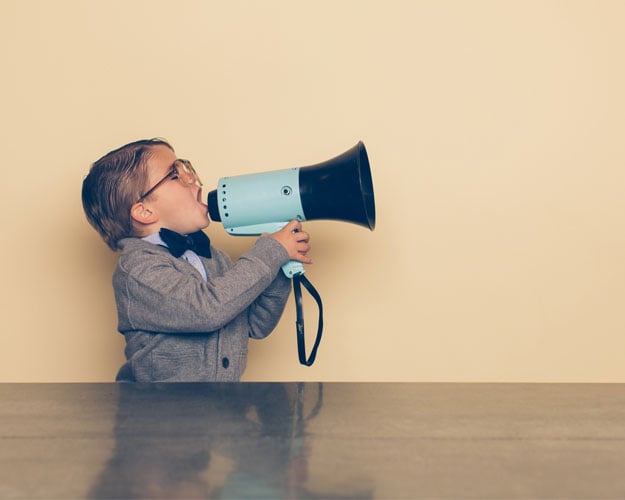 Young Nerd Boy Yells into Megaphone