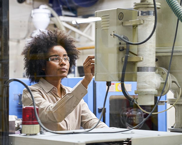 woman operating manufacturing