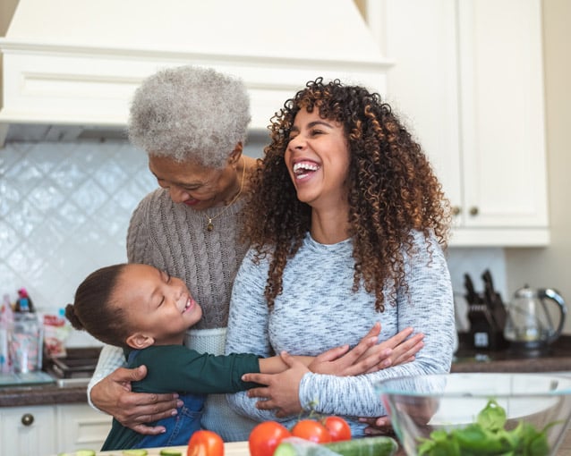 grandma mother and child in kitchen