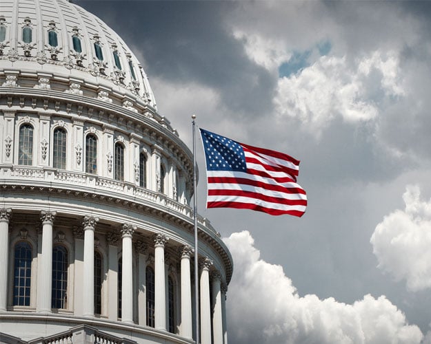 US-Capitol-and-waving-american-flag