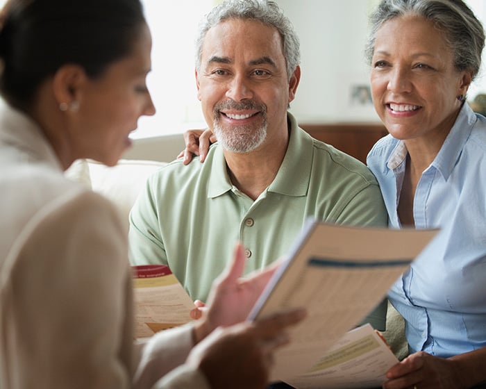 advisor meeting with a man and woman