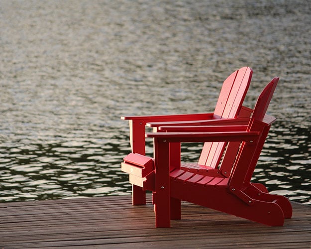 red chairs on dock