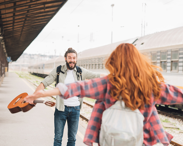 Getty hug musician by train