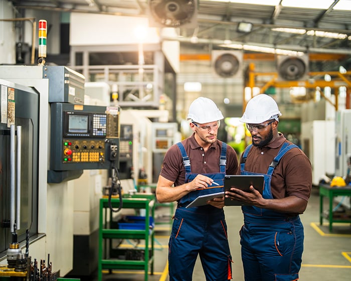 Industrial Engineers reviewing plans