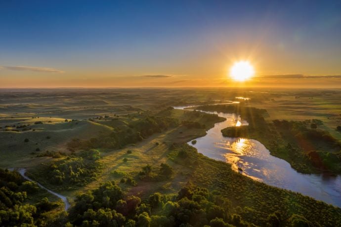 sunrise or sunset over river landscape