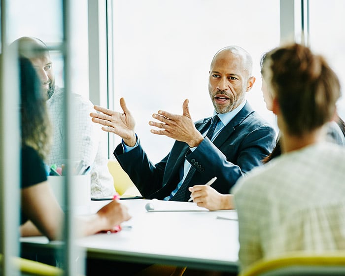 man running a meeting