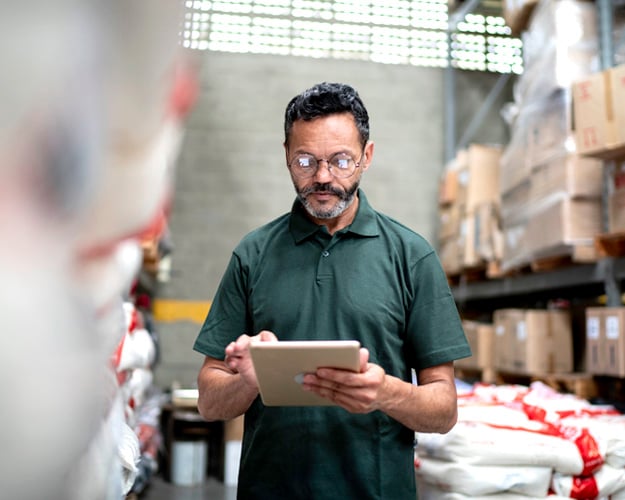 warehouse employee using tablet