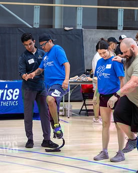 Amputee standing on prosthetic