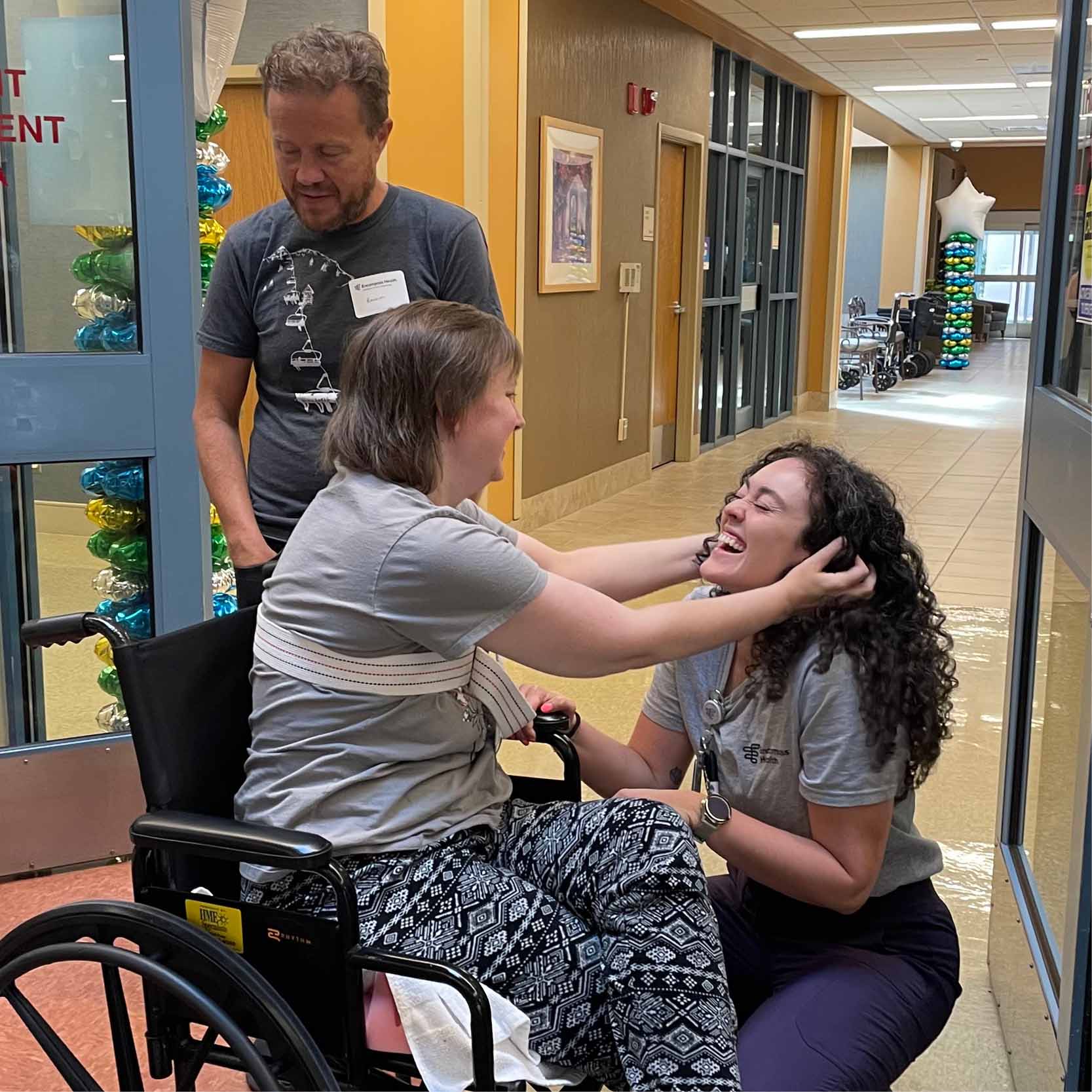A patient and their care team reuniting