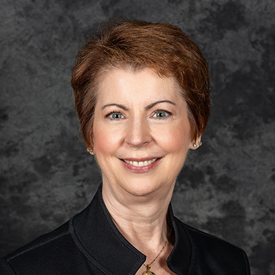 Headshot of Dianne Charsha CEO
