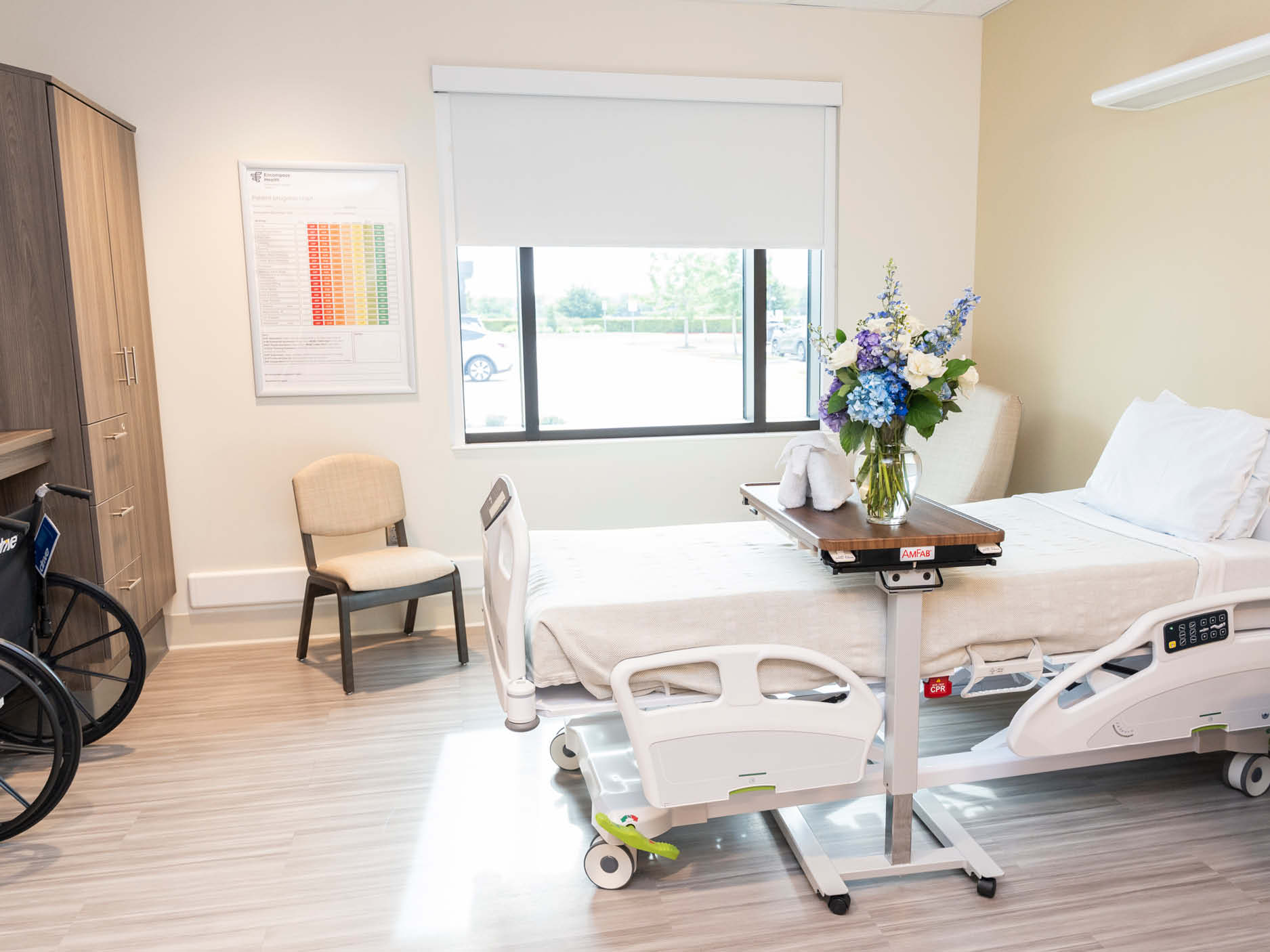 Private patient room in the Katy expansion features accessible furnishings, natural light, and rehabilitation-focused amenities supporting recovery.