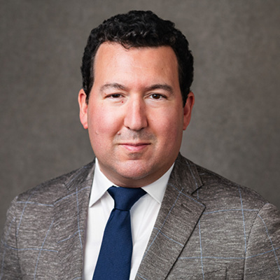 Headshot of Troy Trejo, CEO