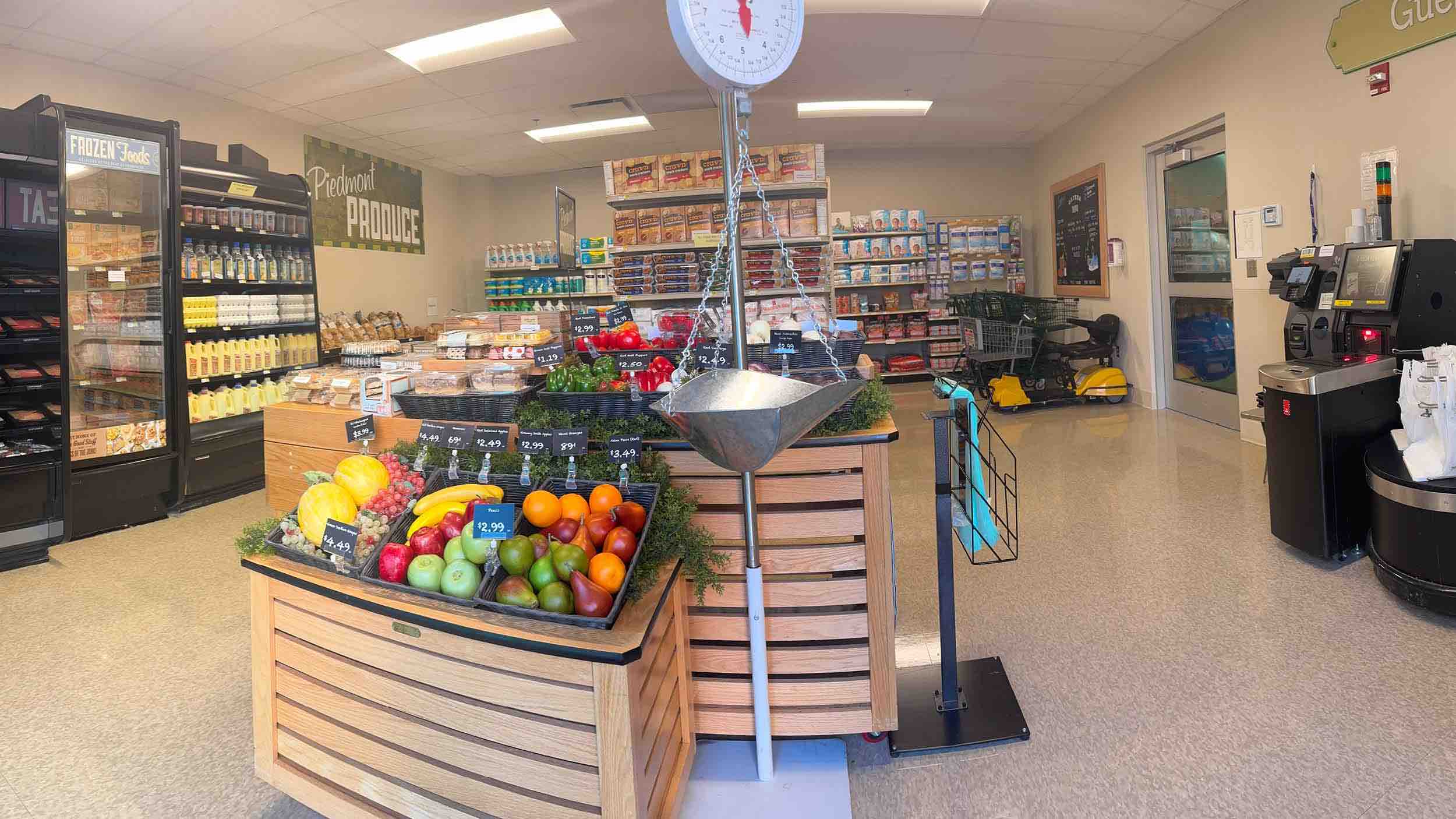 Grocery store simulator inside a rehabilitation hospital features produce displays, shelves and checkout equipment, creating a realistic setting for stroke recovery and daily living therapy.