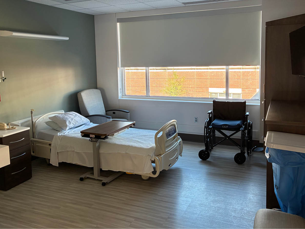 Private patient room at the Encompass Health Franklin expansion featuring modern rehabilitation amenities and accessible care space.