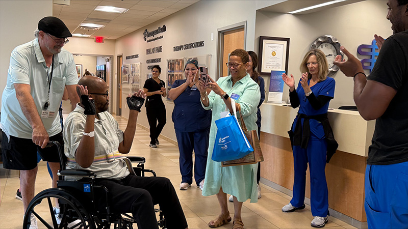 Joe Pearson being discharged from Joe Pearson with the staff of Encompass Health Rehabilitation Hospital of Round Rock