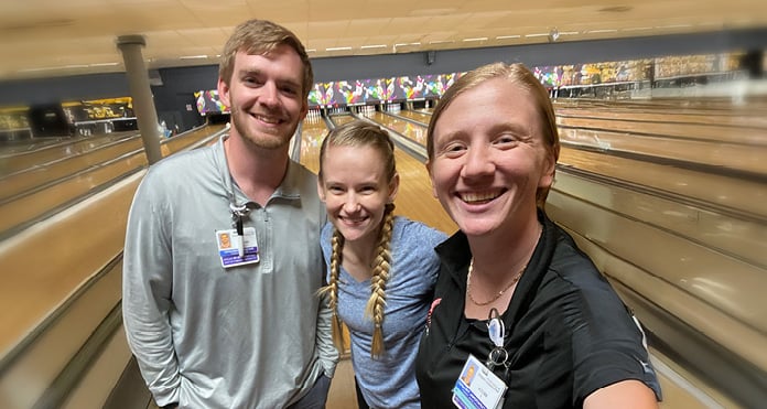 Casie Henrikson and Encompass Health employees