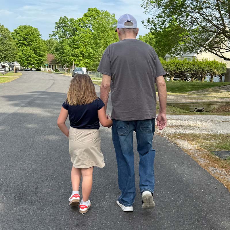 David and a family member from behind while walking