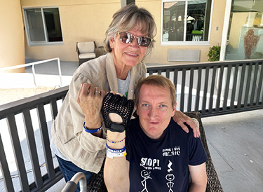 Jared Hughes with his mother, Nina