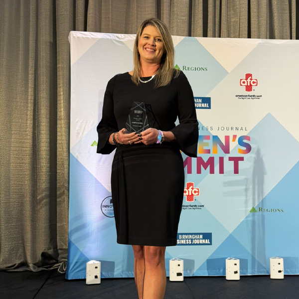 Jennifer Baswell receiving the Birmingham Business Journal’s (BBJ) Women to Watch award