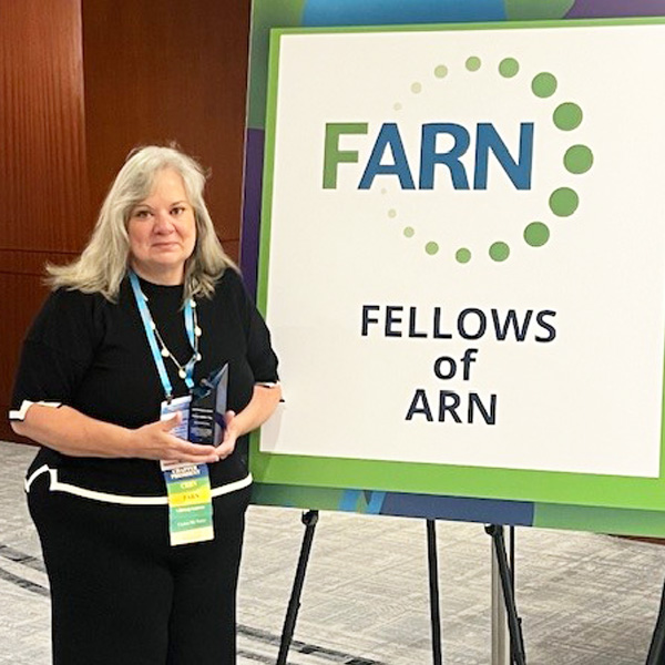 Barbara Winters-Todd receiving the ARN President's Award
