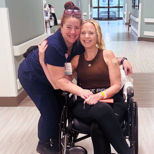 Susan Lannon with an Encompass Health Rehabilitation Hospital of Johnston therapist