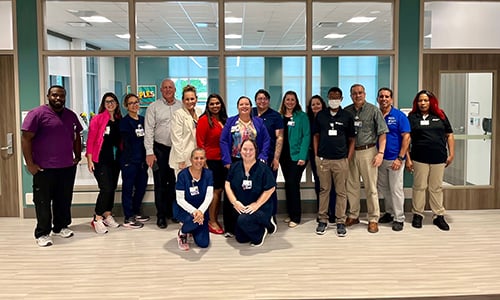 Encompass Health Naples staff posing for a group photo