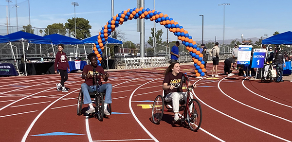 amputee wellness clinic attendees participating in a race