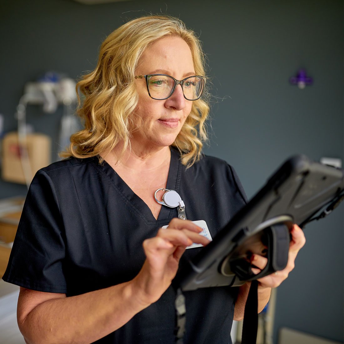 Nurse using a tablet