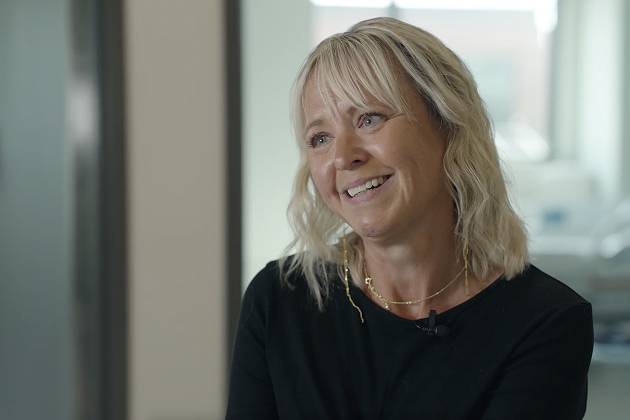 Close-up interview image of a rehabilitation patient in a clinical setting, representing personal recovery outcomes and lived experiences shared in the Susan Lannon brain injury recovery success story.