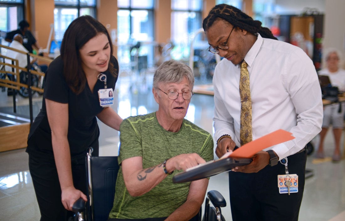 A patient in a wheelchair being discharged