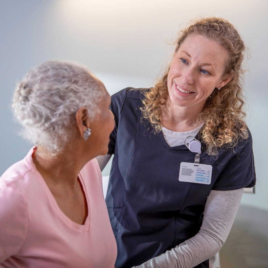 Nurse speaking with a patient