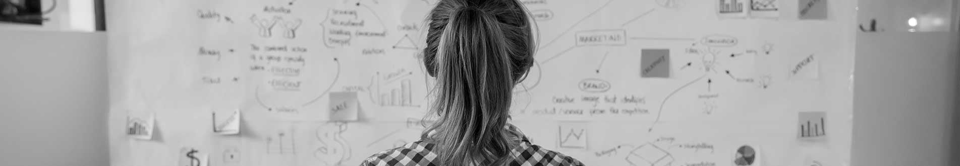 Woman looking at board