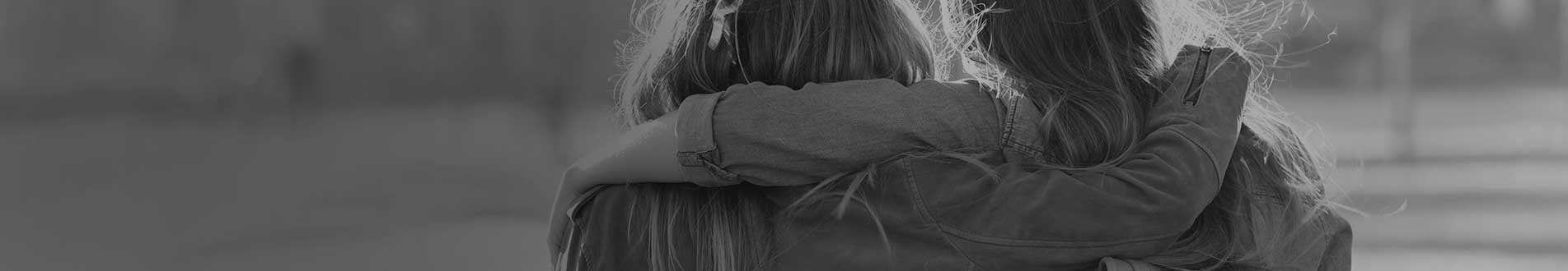 Mother and daughter from behind