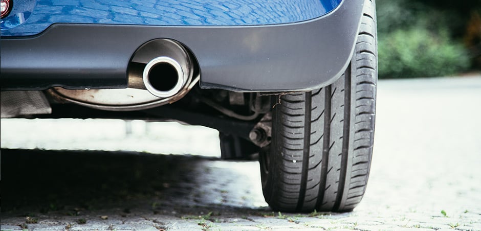 Low angle shot of car's tailpipe