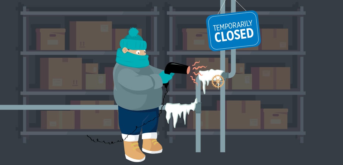 person thawing frozen pipes with blog dryer