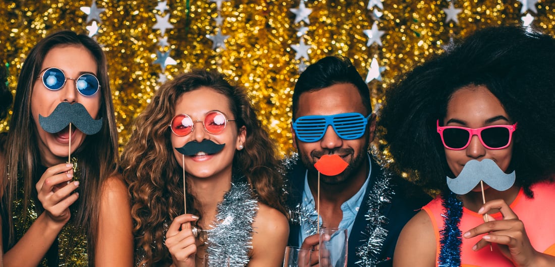 4 people wearing sunglasses and fake mustaches